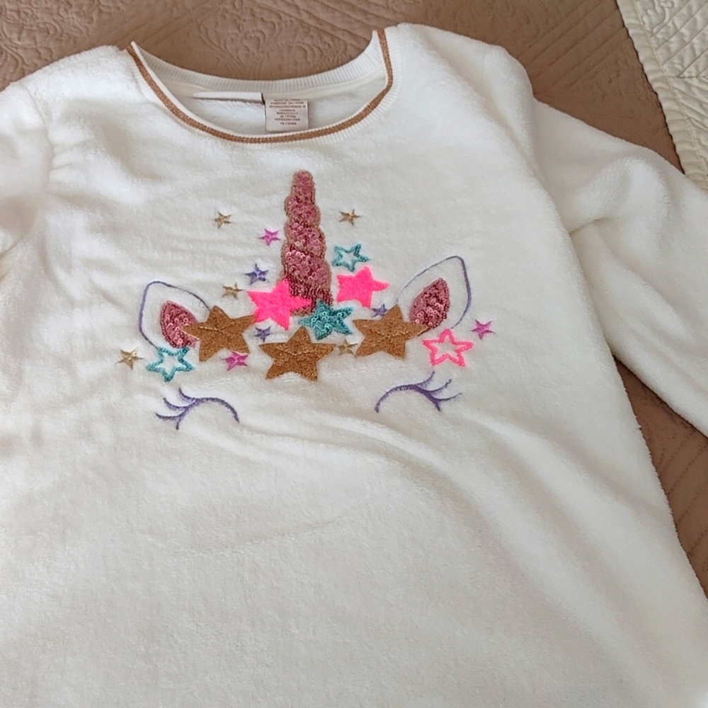 Super soft unicorn top glitter horn and ears..